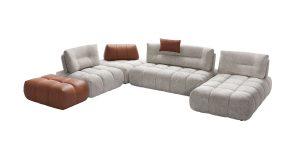 Canapé d’angle Boogie en tissu et cuir, modulable selon les envies, avec assise généreusement rembourrée.